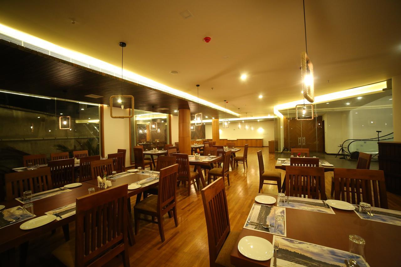 Woodies Bleisure Hotel Kozhikode Exteriör bild