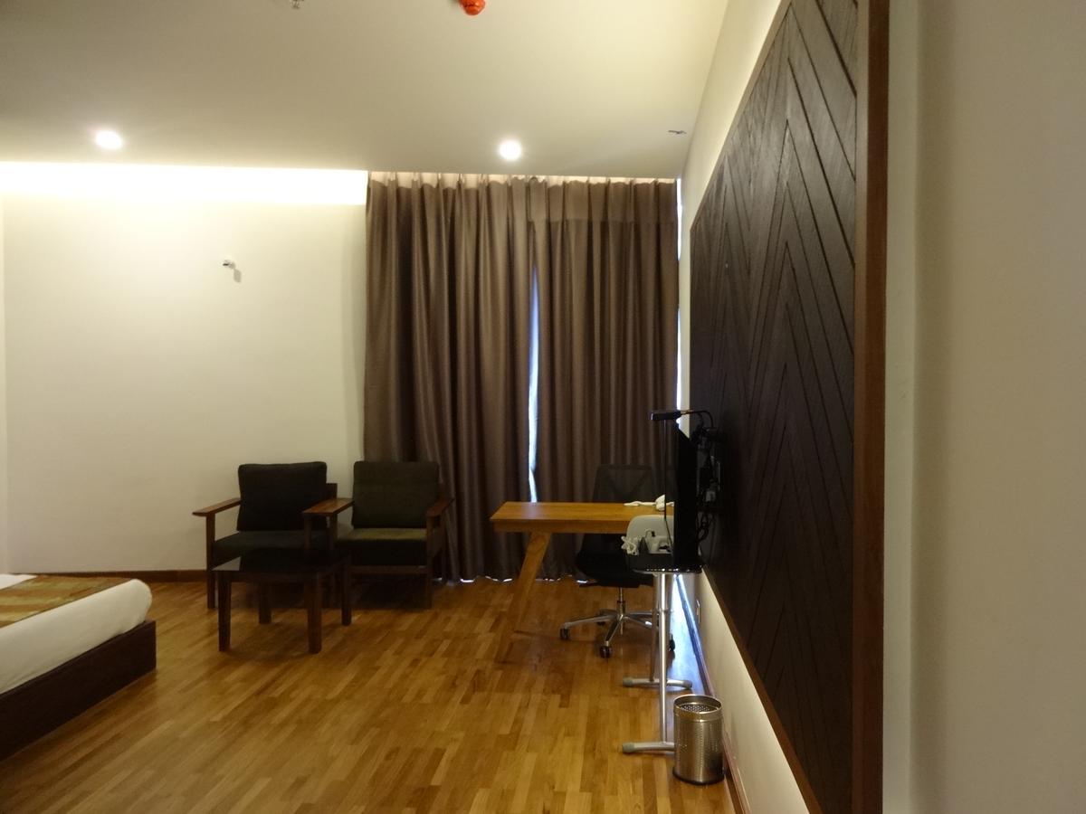 Woodies Bleisure Hotel Kozhikode Exteriör bild
